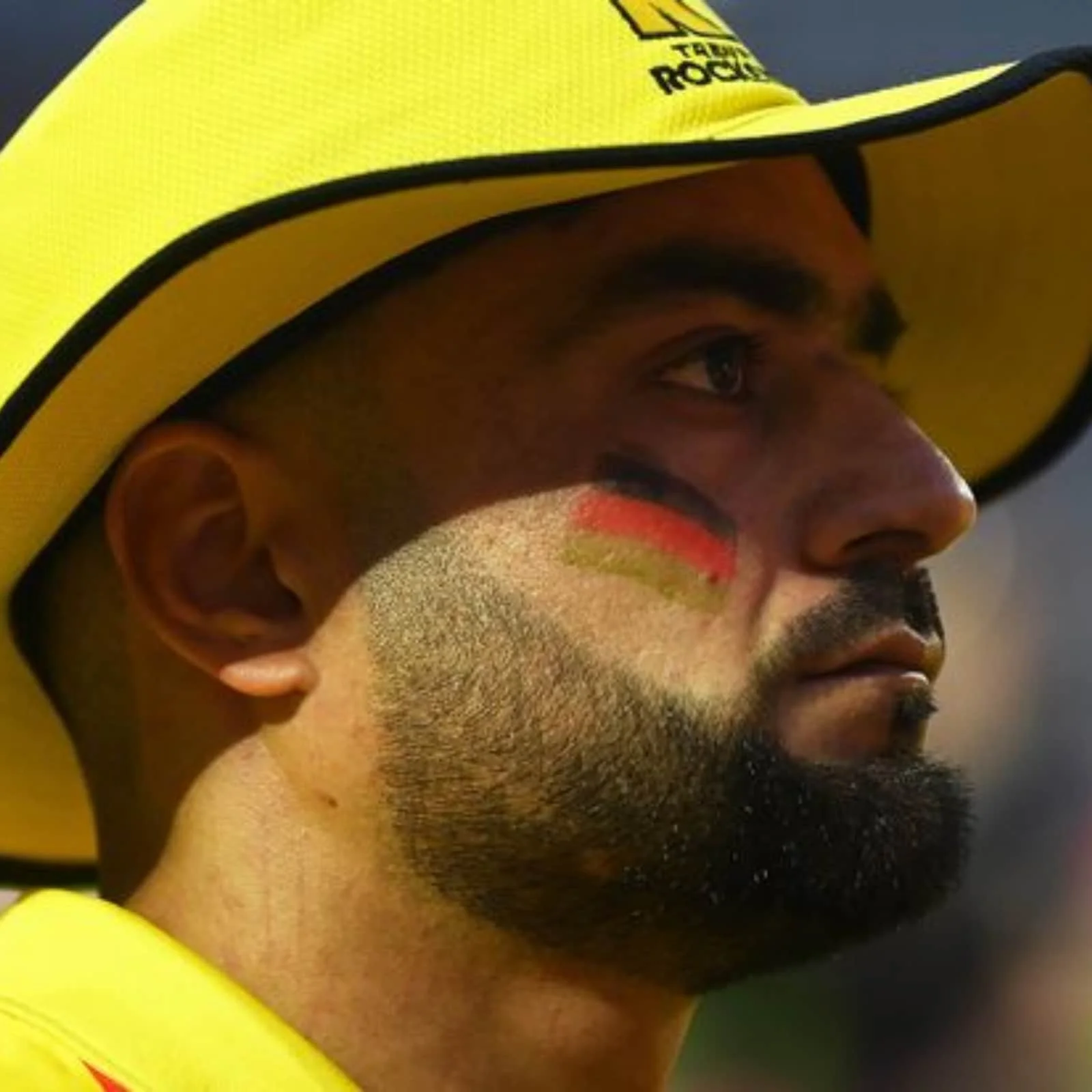 মুখে জাতীয় পতাকা এঁকে ২২ গজে নামলেন আফগান অধিনায়ক রশিদ খান