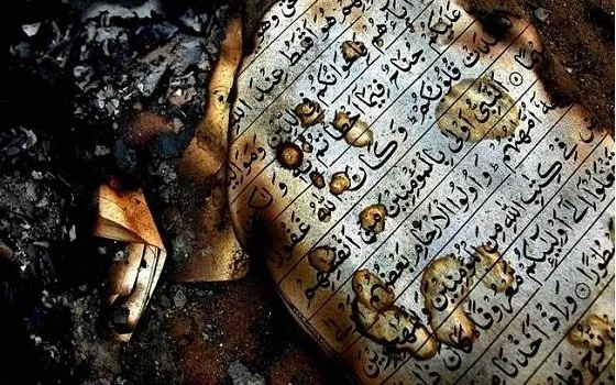 পবিত্র কুরআনের আগুন নেভাতে বাধা দিল পুলিশ