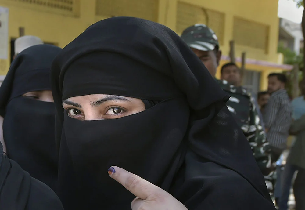 বোরকা তুলে মুখ পরীক্ষার পর ভোটের অনুমতি দেওয়ার দাবিতে কমিশনের দ্বারস্থ বিজেপি